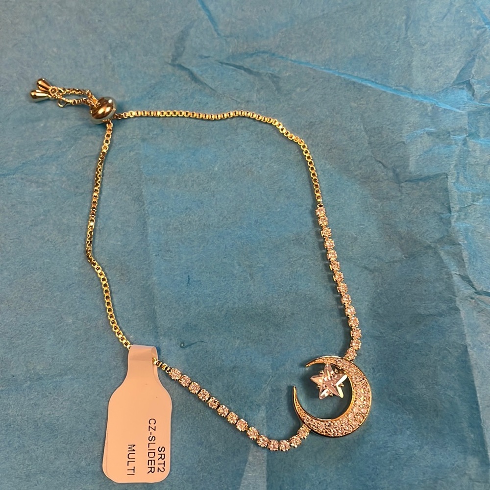 NWT bracelet CZ with a gold chain
